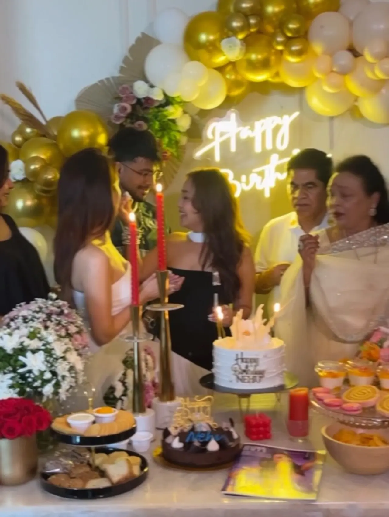 Neha Kakkar also shared a touching family moment from her birthday celebrations, where she was seen feeding cake to her sister, Sonu Kakkar, and her parents.